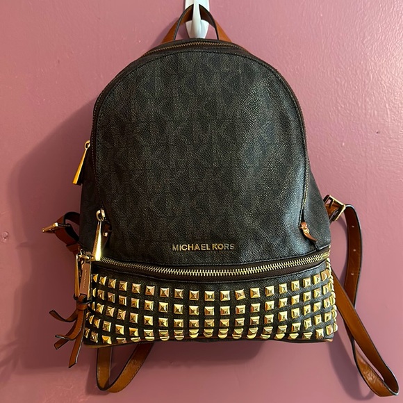 I am selling a Micheal Kors studded backpack in colors brown & gold. - Picture 1 of 9